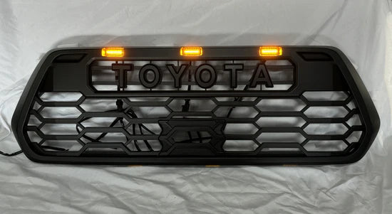 Toyota Tacoma 2016-2023 V2 TRD Pro Style Front Grille + Raptor LED Lights