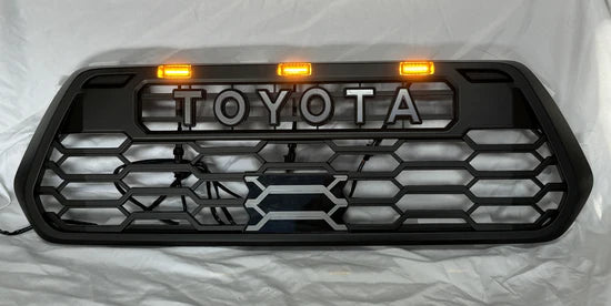 Toyota Tacoma 2016-2023 V2 TRD Pro Style Front Grille + Raptor LED Lights