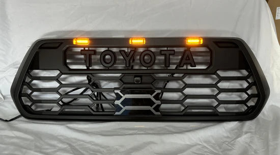 Toyota Tacoma 2016-2023 V2 TRD Pro Style Front Grille + Raptor LED Lights