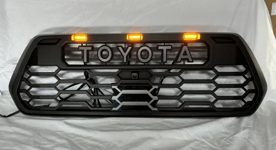 Toyota Tacoma 2016-2023 V2 TRD Pro Style Front Grille + Raptor LED Lights