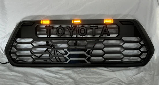 Toyota Tacoma 2016-2023 V2 TRD Pro Style Front Grille + Raptor LED Lights