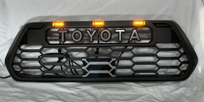 Toyota Tacoma 2016-2023 V2 TRD Pro Style Front Grille + Raptor LED Lights