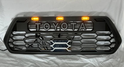 Toyota Tacoma 2016-2023 V2 TRD Pro Style Front Grille + Raptor LED Lights