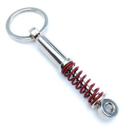 Creative Metal Shock Absorber Keychain – Unique Car Mod Gift for Auto Enthusiasts