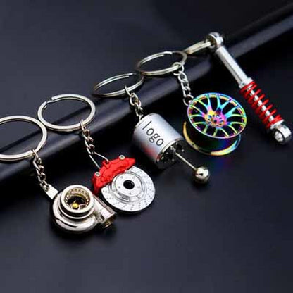 Creative Metal Shock Absorber Keychain – Unique Car Mod Gift for Auto Enthusiasts